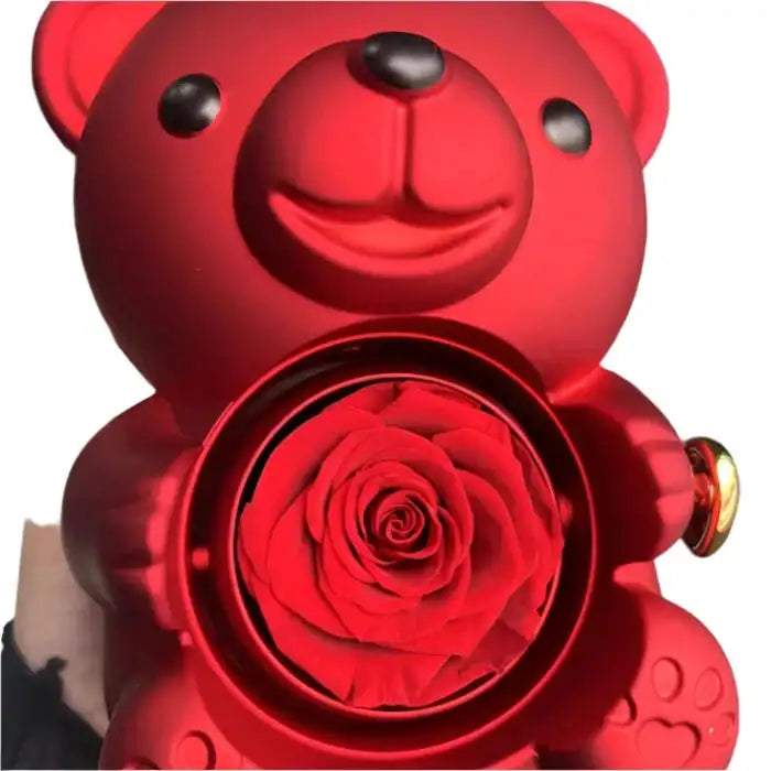 Romantic Teddy Red Bear With Preserved Rose Real Rose in Elegant Box - MaribelaShop2 This beautifully crafted jewelry box features a delightful bear design that rotates, revealing a compartment adorned with exquisite roses. Perfect for storing small treasures or as a decorative keepsake, this box makes an ideal gift for special occasions like birthdays, anniversaries, or Valentineās Day. Its compact design and intricate details ensure itās a standout piece that brings joy and elegance to any space.(Zdr)