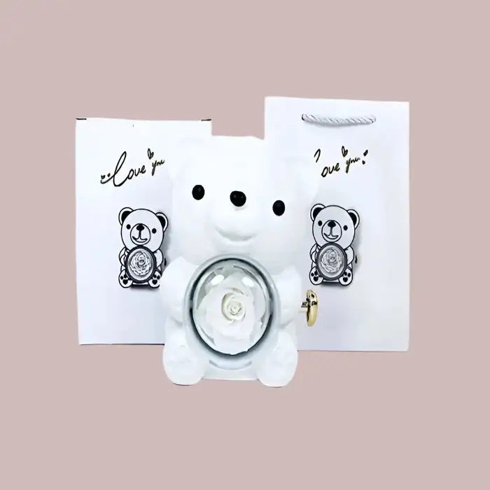 Romantic Teddy Red Bear With Preserved Rose Real Rose in Elegant Box - MaribelaShop2 This beautifully crafted jewelry box features a delightful bear design that rotates, revealing a compartment adorned with exquisite roses. Perfect for storing small treasures or as a decorative keepsake, this box makes an ideal gift for special occasions like birthdays, anniversaries, or Valentineās Day. Its compact design and intricate details ensure itās a standout piece that brings joy and elegance to any space.(Zdr)