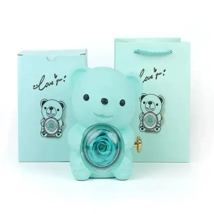 Romantic Teddy Red Bear With Preserved Rose Real Rose in Elegant Box - MaribelaShop2 This beautifully crafted jewelry box features a delightful bear design that rotates, revealing a compartment adorned with exquisite roses. Perfect for storing small treasures or as a decorative keepsake, this box makes an ideal gift for special occasions like birthdays, anniversaries, or Valentineās Day. Its compact design and intricate details ensure itās a standout piece that brings joy and elegance to any space.(Zdr)
