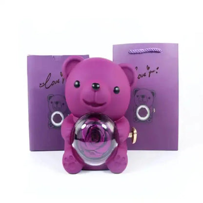 Romantic Teddy Red Bear With Preserved Rose Real Rose in Elegant Box - MaribelaShop2 This beautifully crafted jewelry box features a delightful bear design that rotates, revealing a compartment adorned with exquisite roses. Perfect for storing small treasures or as a decorative keepsake, this box makes an ideal gift for special occasions like birthdays, anniversaries, or Valentine’s Day. Its compact design and intricate details ensure it’s a standout piece that brings joy and elegance to any space.(Zdr)