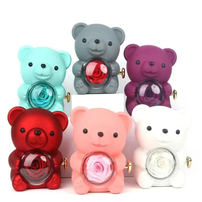 Romantic Teddy Red Bear With Preserved Rose Real Rose in Elegant Box - MaribelaShop2 This beautifully crafted jewelry box features a delightful bear design that rotates, revealing a compartment adorned with exquisite roses. Perfect for storing small treasures or as a decorative keepsake, this box makes an ideal gift for special occasions like birthdays, anniversaries, or Valentine’s Day. Its compact design and intricate details ensure it’s a standout piece that brings joy and elegance to any space.(Zdr)